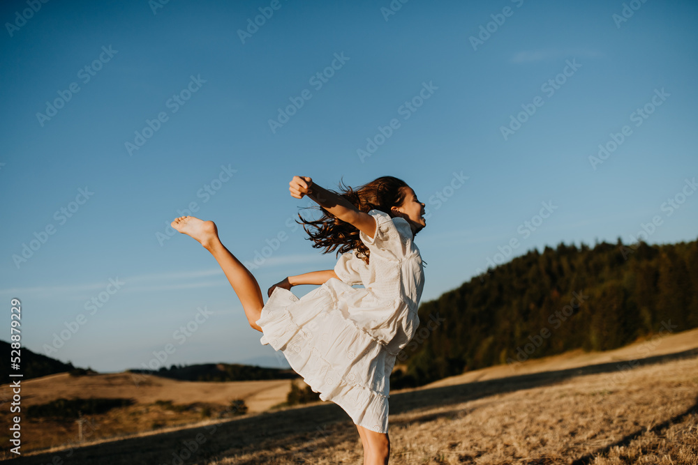 Portrait of a beautiful little girl feeling free in summer in nature. Portrait of a beautiful little girl feeling free in summer in nature.