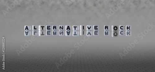 alternative rock word or concept represented by black and white letter cubes on a grey horizon background stretching to infinity