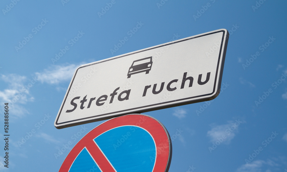D-52 Traffic zone sign in Poland. Entering an internal road located in the traffic zone. With B-35 No parking sign below. Letters in Polish language, Strefa Ruchu means Traffic Zone. - obrazy, fototapety, plakaty 