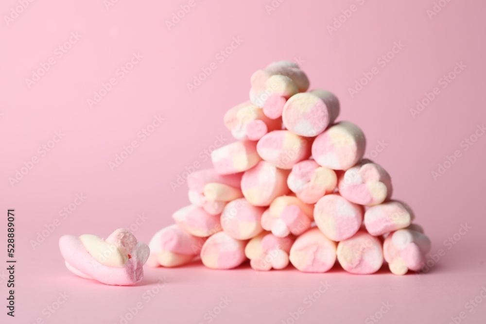 Stack of tasty marshmallows on pink background Stack of tasty marshmallows on pink background