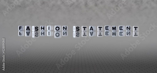 fashion statement word or concept represented by black and white letter cubes on a grey horizon background stretching to infinity