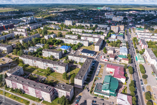 panoramic view from a great height of a small provincial town with a private sector and high-rise apartment buildings © hiv360