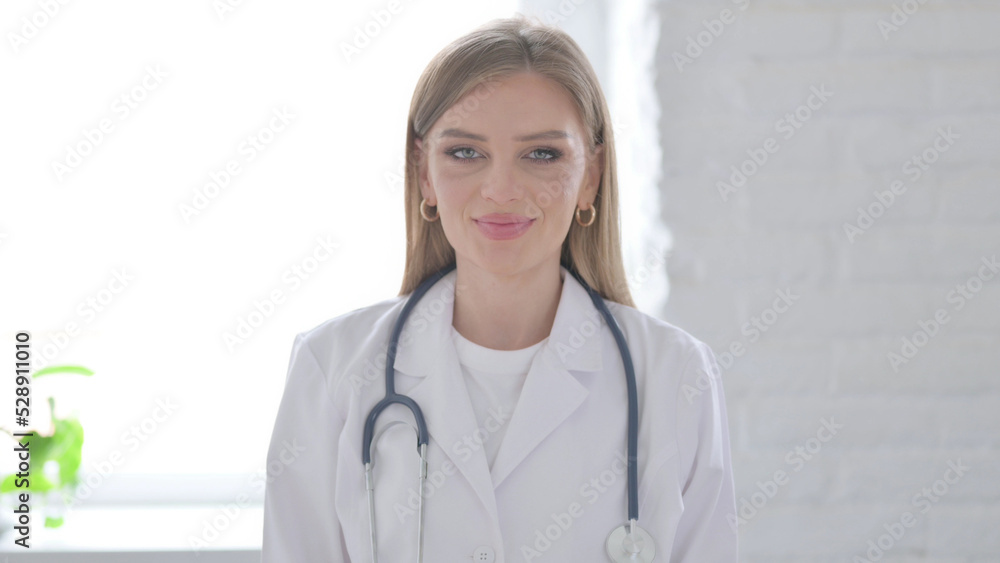 Portrait of Lady Doctor Shaking Head as Yes Sign, Approval Portrait of Lady Doctor Shaking Head as Yes Sign, Approval