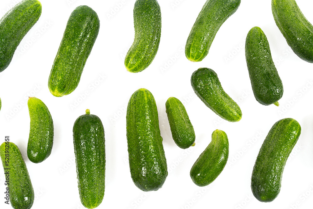 Whole cucumbers isolated on white background. Food backgrounds. Whole cucumbers isolated on white background. Food backgrounds.