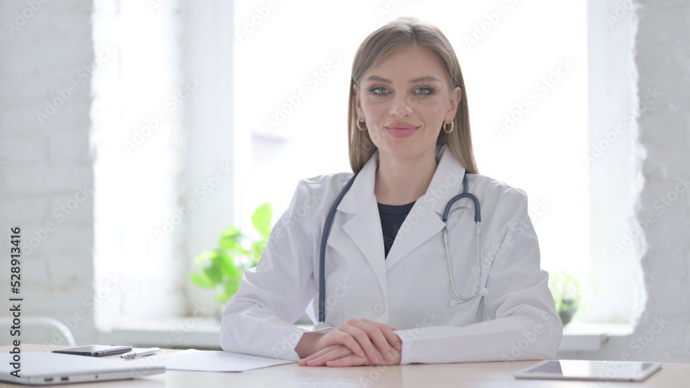 Lady Doctor Shaking Head in Acceptance in clinic Lady Doctor Shaking Head in Acceptance in clinic