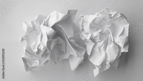 Crumpled paper ball isolated on white with clipping path