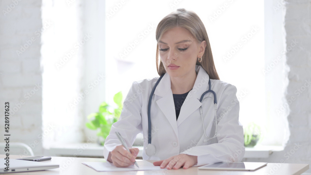 Lady Doctor Writing on Paper in Clinic, Medical Report Lady Doctor Writing on Paper in Clinic, Medical Report