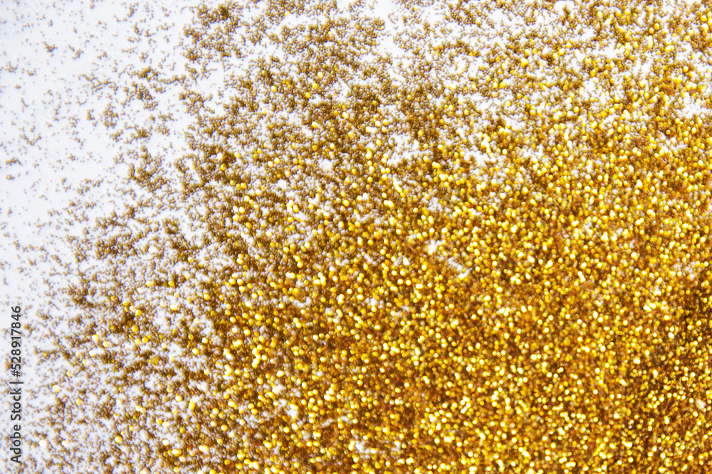 Golden glitter on white background. Trendy backdrop for your design. Golden glitter on white background. Trendy backdrop for your design.