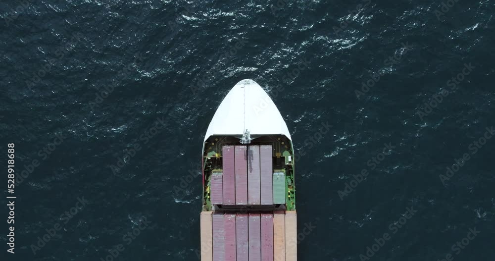 Aerial top view of a cargo ship carrying containers for export cargo. Aerial top view of a cargo ship carrying containers for export cargo.