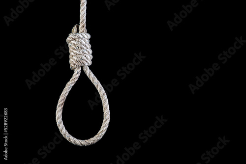 Hangmans Noose Isolated Against a Black Background photo
