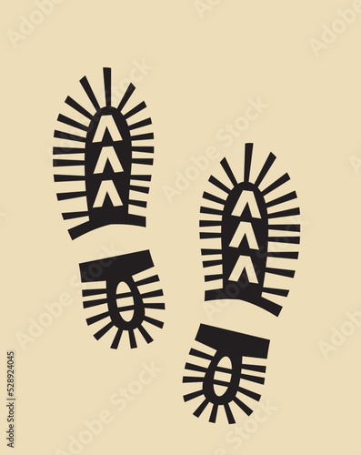 Black shoe print on yellow background