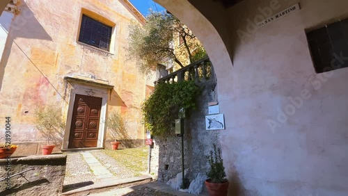 Panorama of covered San Martino street, Castello, Valsolda, Italy photo