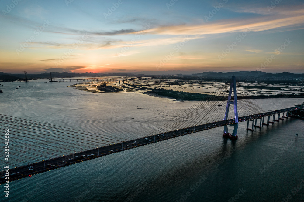 Shantou City, Guangdong Province, China. Chinese translation on the bridge:Shantou Queshi bridge
