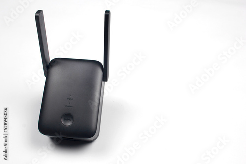 Fotografie Black WiFi repeater isolated on white background
