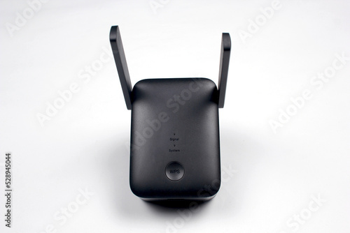 Fotografie Black WiFi repeater isolated on white background