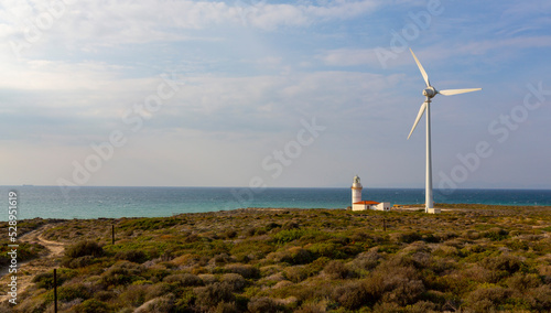 Polente Lighthouse is located at the westernmost edge of Bozcaada and was built in 1861. Polente light is 32 meters high and can send its light up to 15 nautical miles or 28 kilometers. photo