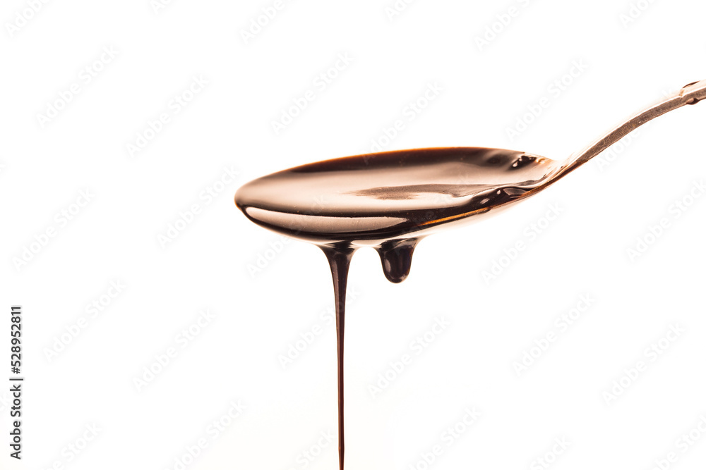 Fototapeta premium Delicious smooth chocolate sauce, flowing chocolate sauce