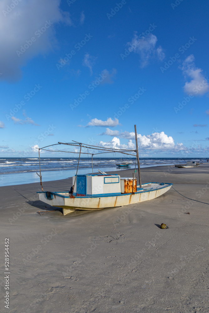 boat on the beach in the city of Ilheus, State of Bahia, Brazil