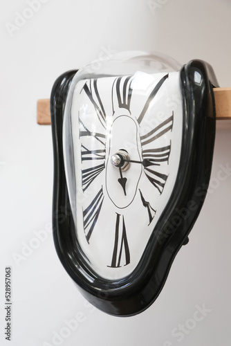 Decorative clocks drain off the shelf. The clock is a symbol of the impermanence of time. Free space for text.