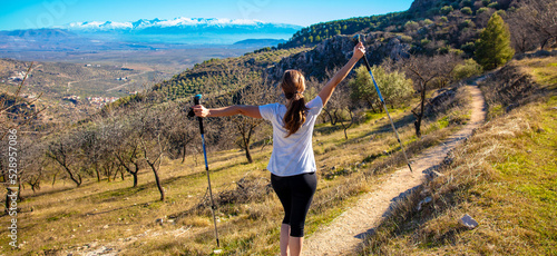 woman hiking in nature,  sierra nevada mountain- Spain photo