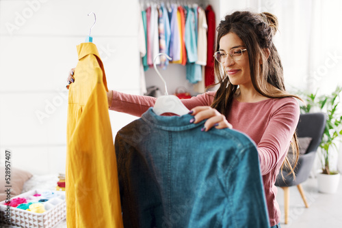 Φωτογραφία Woman choosing what to wear