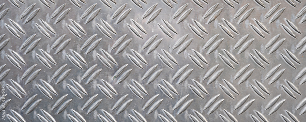 Aluminum checker plate cover metal texture pattern background panorama Aluminum checker plate cover metal texture pattern background panorama