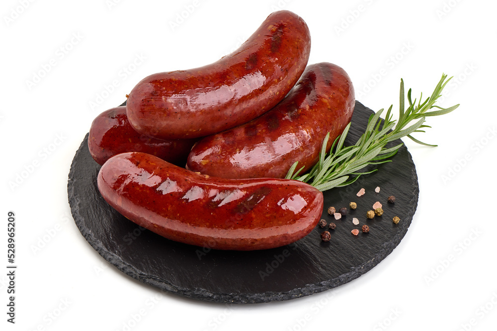 Grilled pork sausages with rosemary, close-up, isolated on white background. Grilled pork sausages with rosemary, close-up, isolated on white background.