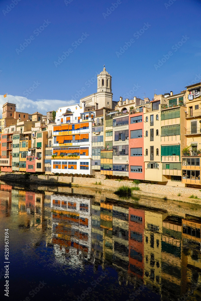 Scenic view of the colorful houses of Girona on the river.