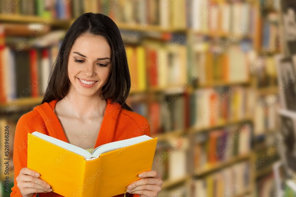 Pensive woman book lover spending free leisure time in library, Pensive woman book lover spending free leisure time in library,
