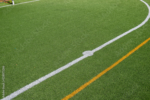 penalty point of an artificial turf football field © Vic