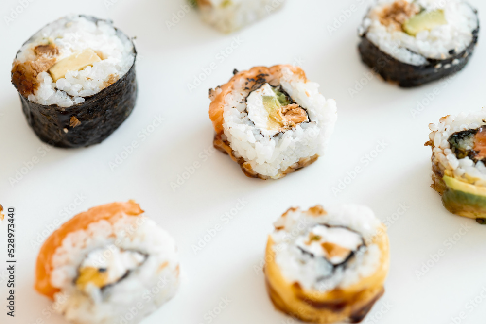 Sushi Rolls Set, maki, philadelphia and california rolls, on a white background.