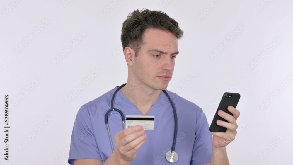 Online Shopping on Smartphone by Young Doctor on White Background Online Shopping on Smartphone by Young Doctor on White Background