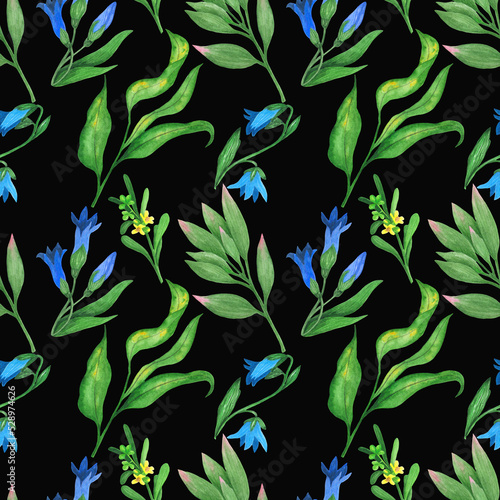 Watercolor seamless wild flowers and green leaves pattern on black background.For textile,fabrics.