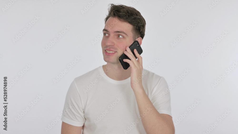 Young Man Talking on Phone on White Background Young Man Talking on Phone on White Background