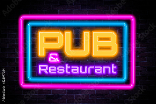 Pub and Restaurant neon banner on brick wall background.