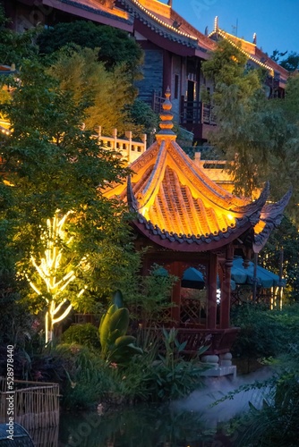 Vertical shot of a traditional Chinese building in the evening in Dongpo, Meishan city photo