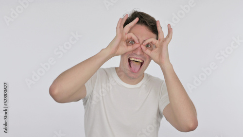 Funny Young Man with Binocular Gesture Searching on White Background