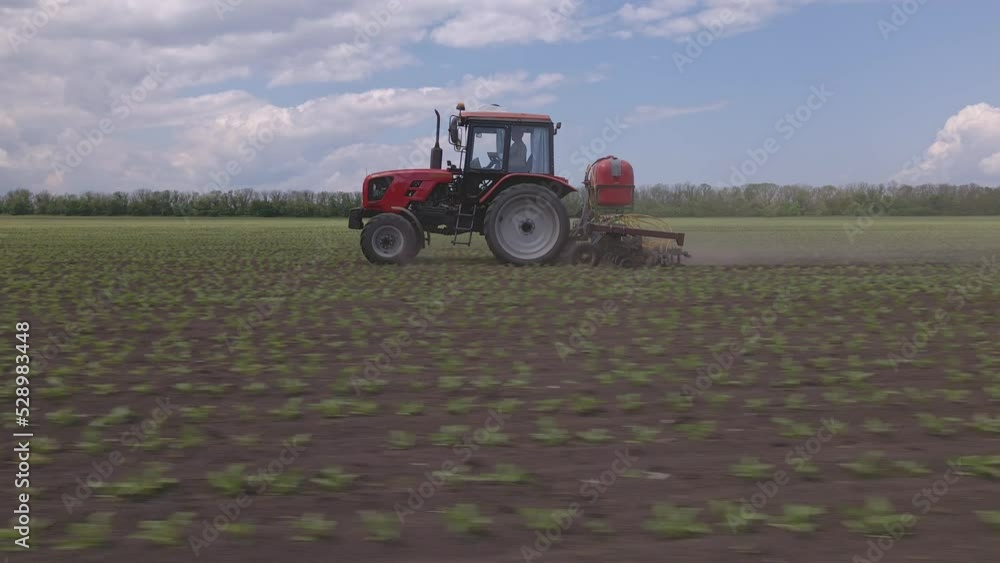 Agricultural machinery working in the field Agricultural machinery working in the field