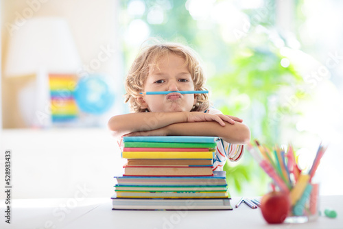 Kids doing homework. Children go back to school. photo