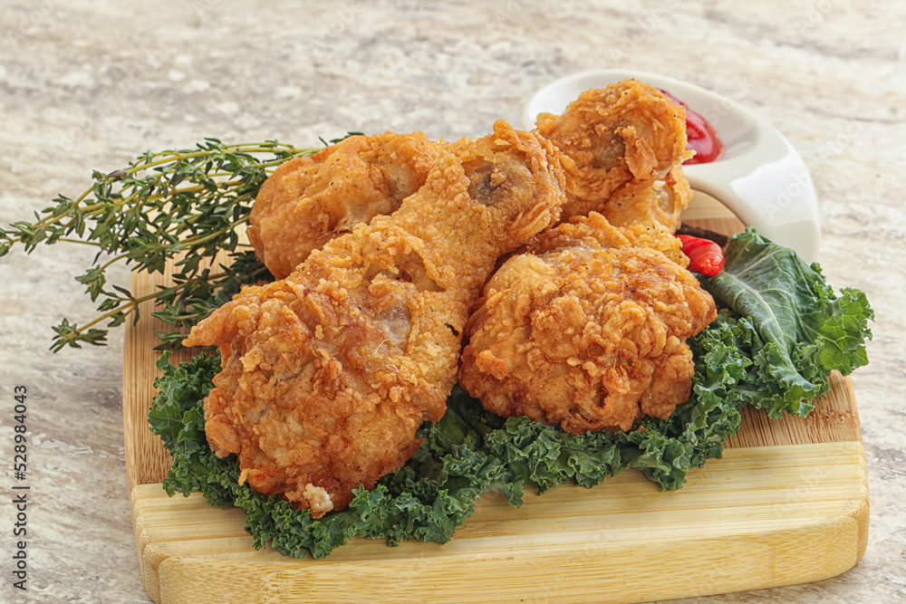 Fried chicken drumsticks with tomato sauce Fried chicken drumsticks with tomato sauce
