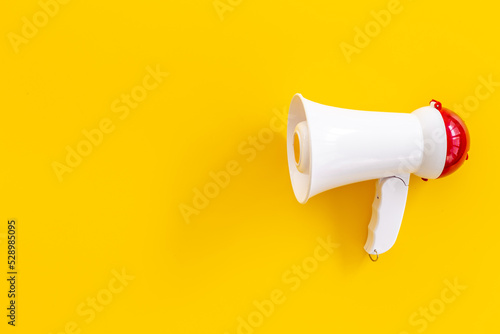 White loudspeaker for announcing hiring or advertising. Megaphone device