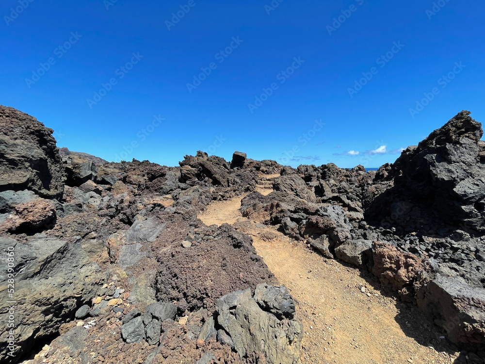 path between lava stones on the island of el Hierro