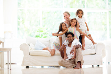 Beautiful family with kids at home