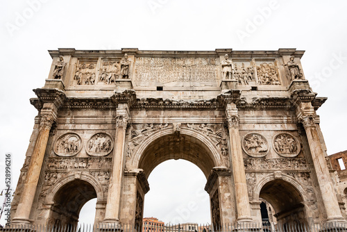 arch of constantine in rome italy renaissance art hisoty in italy europe and roman empire with olive trees and roman ruins