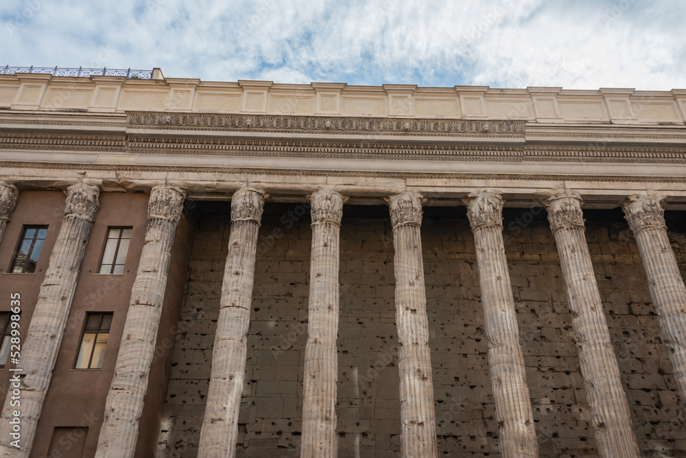 facade of the building in rome with roman columns