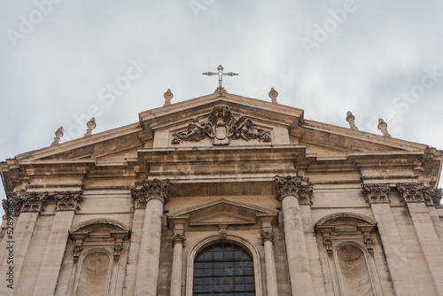 bell tower of the church and rome street architectural historical building in rome city italy with ancient stone and architecture