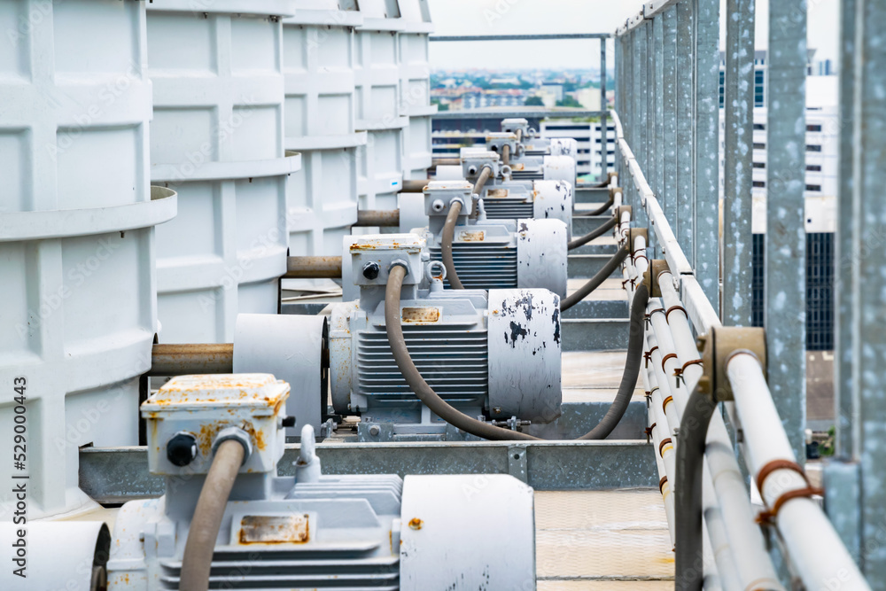 Electric motor industry in cooling tower system and install on rooftop of building for chiller system. Electric motor industry in cooling tower system and install on rooftop of building for chiller system.