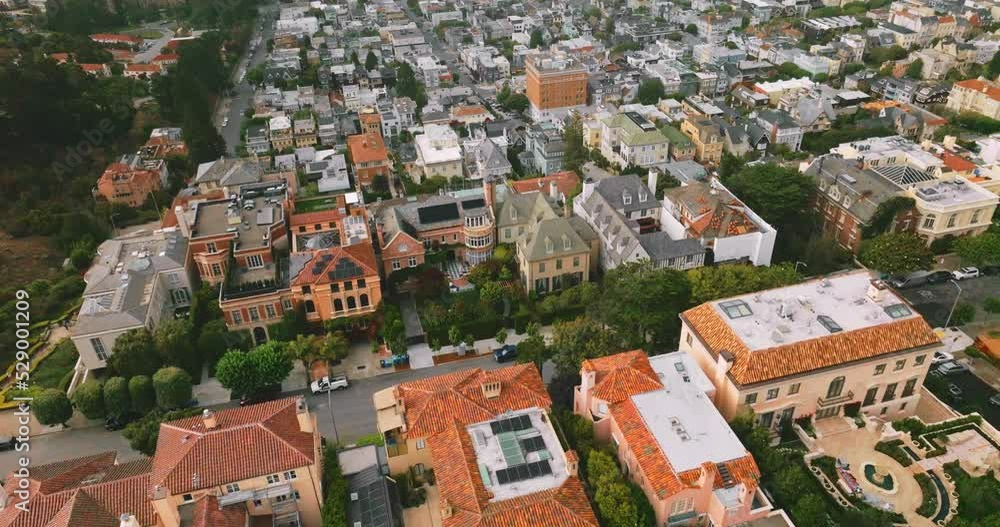 Rich exclusive mansions built closely to each other. View of beautiful San Francisco, California, USA from aerial perspective. Rich exclusive mansions built closely to each other. View of beautiful San Francisco, California, USA from aerial perspective.