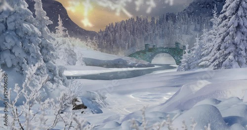Animated winter landscape of a snow-covered valley with a river and bridge, and mountains and sunset in the background photo