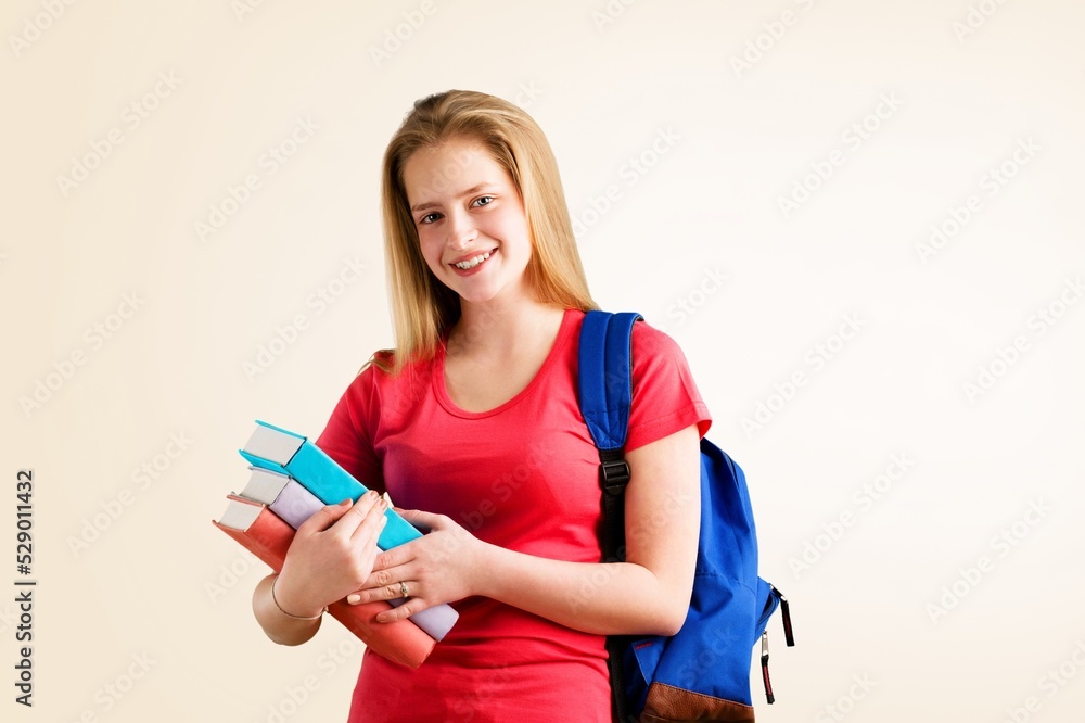 Young student girl posing on background Young student girl posing on background